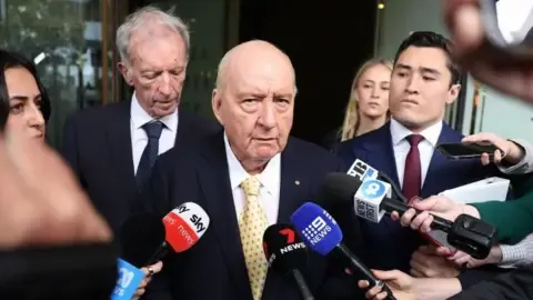 Indecent Assault Accusations Against Top Aussie Media Personality Reduced
